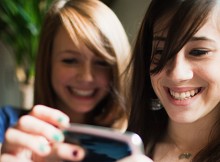 teenagers using smartphone